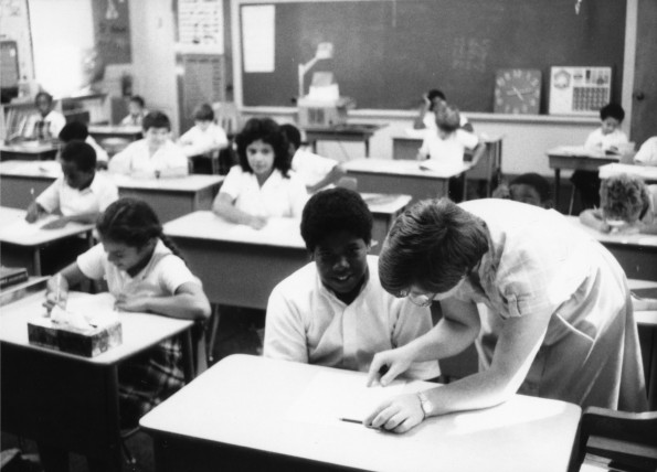 Linda Webb talking with a student