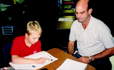 Stephen Burton helping a student